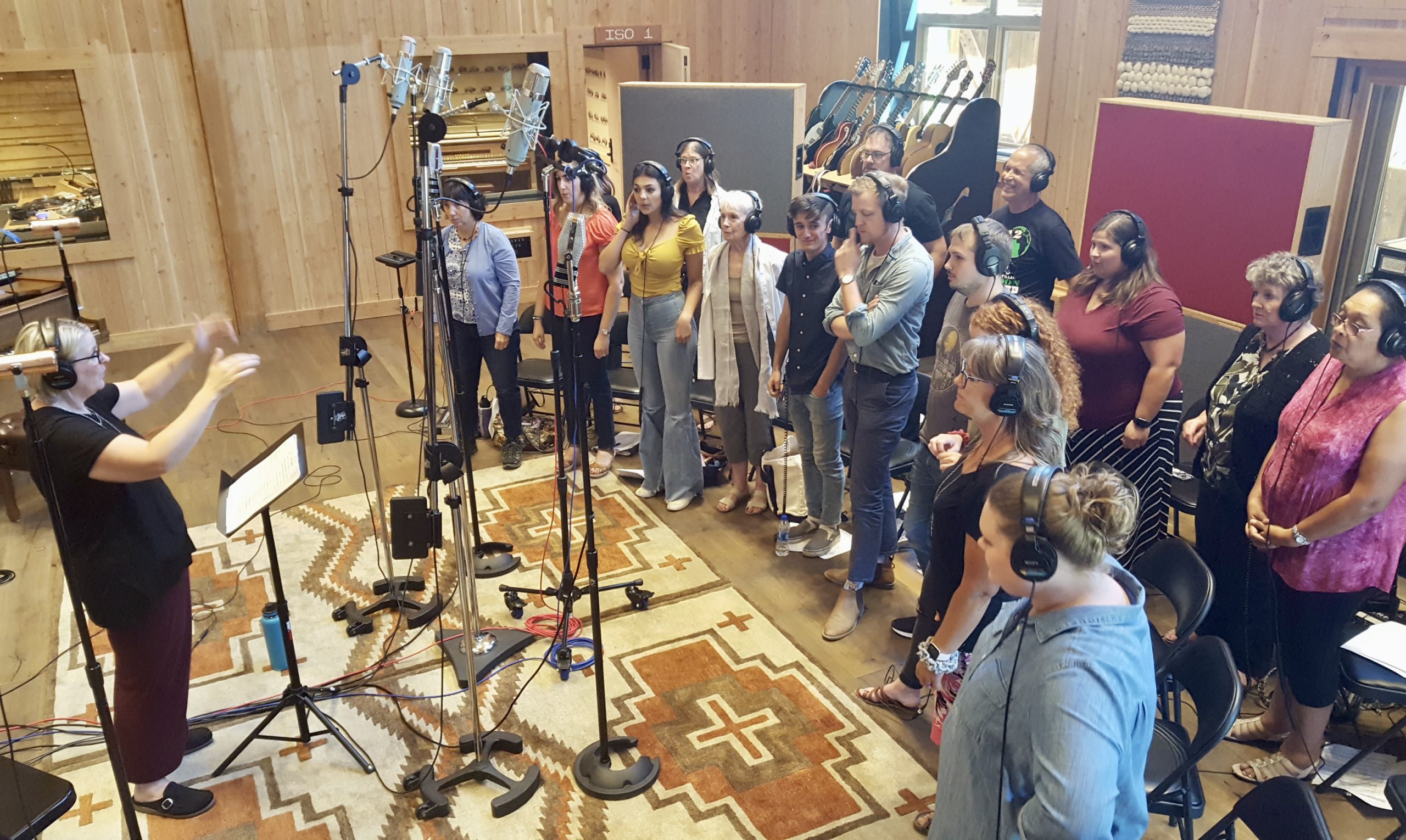 Director Mindy Wall ably leads the choir during the recording session.